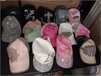 Box of women's hats with bling