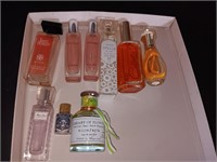 Box of women's perfume bottles and more.