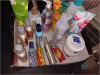 Box Of air freshener, spray lotion and more.