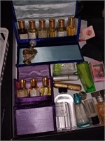 Box of perfume bottles and more.
