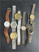 Group of 9 stainless steel watches