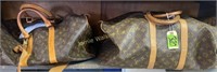 2 Louis Vuitton Monogram Leather Duffel Bags. Up