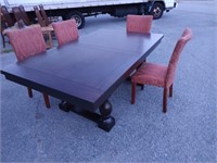Rectangle black table with 8 upholstered chairs