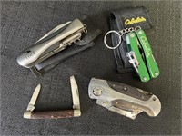 Variety of 4 multi tools, pocket knives.