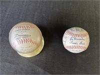 Stamped & autographed baseballs.  One display
