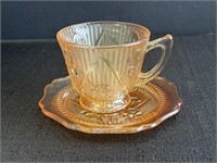 Marigold Carnival Glass cup & saucer, Iris