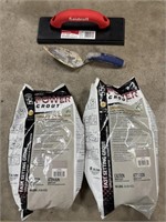 Grout tools & 2 bags of Power Grout