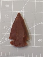 A small red arrowhead