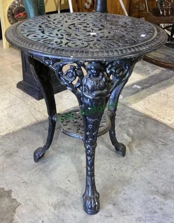 Amazing antique cast iron garden table - two