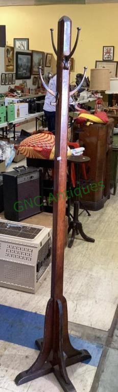 Cool vintage wooden coat rack, with metal coat