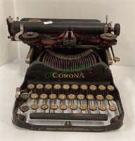 Antique Corona typewriter by the Corona