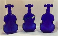 Set of three cobalt blue musical instrument bud