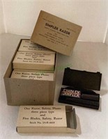 Vintage case of 12 Simplex military razor