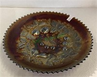 Carnival glass dish with fruit motif measuring