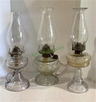 Lot of three vintage clear glass oil lamps all