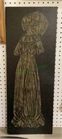 Large rubbing of a woman in a long dress