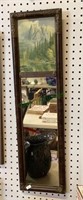Antique tall narrow wall mirror with pictures of