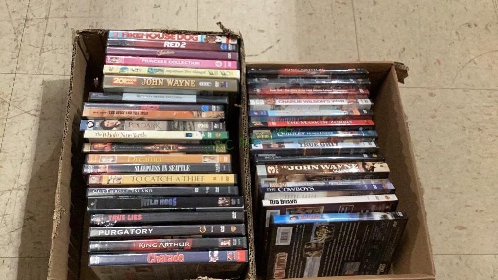 Two boxes of DVDs titles include John Wayne,