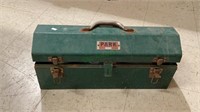 Large green metal toolbox with Mason tile tools