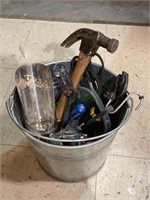 Galvanized bucket full of tools includes