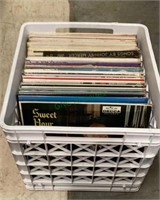 Plastic crate of albums includes mostly religious