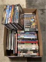 Large box of DVDs includes titles such as Catch