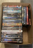 Box of DVDs includes titles such as Cheaper