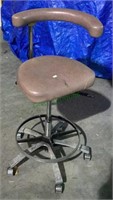 Industrial adjustable height stool from physician