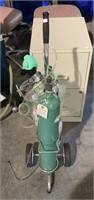Portable oxygen tank with empty oxygen canister.