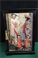 Small Curio Case Full of Oriental Lady Figurines