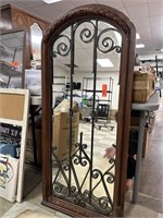 LARGE ARCHED WALL MIRROR W IRON BARS