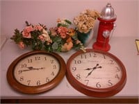 large clocks, faux flowers, hydrant decor