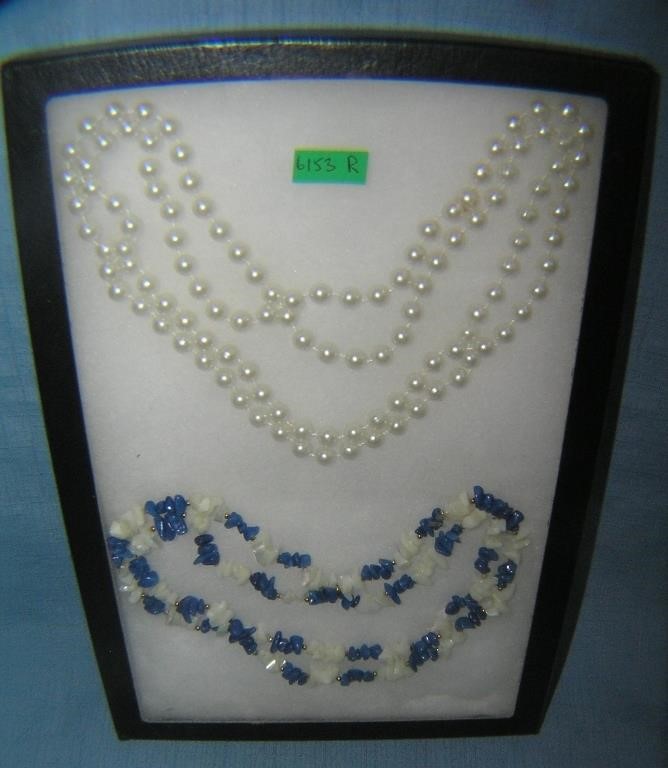 Pair of costume jewelry necklaces