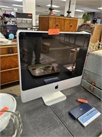 APPLE IMAC COMPUTER POWERS ON NOTE