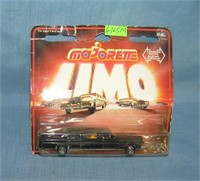 Vintage cast metal stretch limo toy mint on card