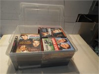 LARGE LOT ASSORTED DVD IN PLASTIC CONTAINER