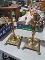 PAIR OF UNIQUE CLAW FOOTED BRASS CANDLE HOLDERS