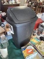 Nice black stairlight trash can with Is flip lid