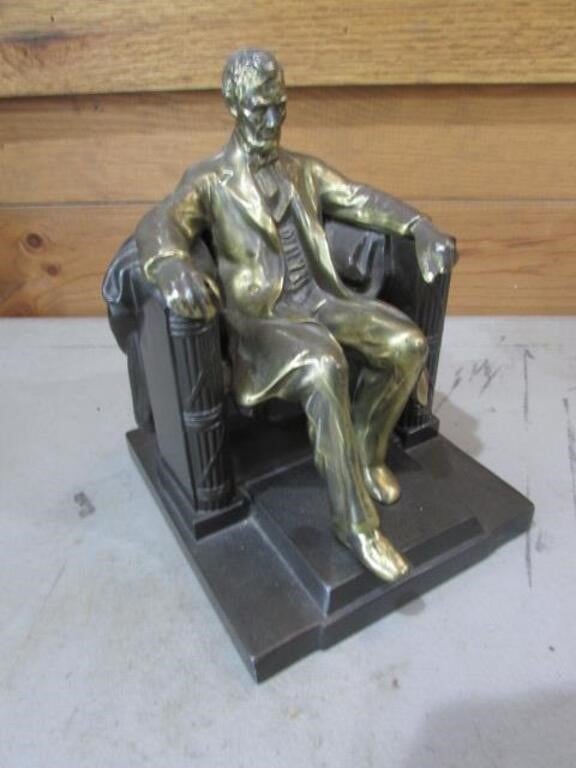 lincoln sitting in chair,brass w/marble or metal