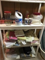 Towels, linens, rug, paper products
Shelf