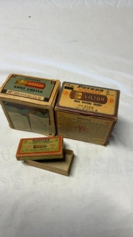 Old ammo boxes some shotgun shells
