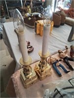 2 brass colored battery operated candlesticks
