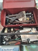 Red metal toolbox with tools hardware and the