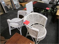 2 Wicker Chairs + White Folding Chair.