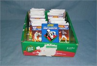 Box full of unopened football card packs