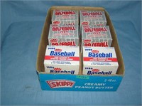 Box full of Fleer factory sealed updated traded ca