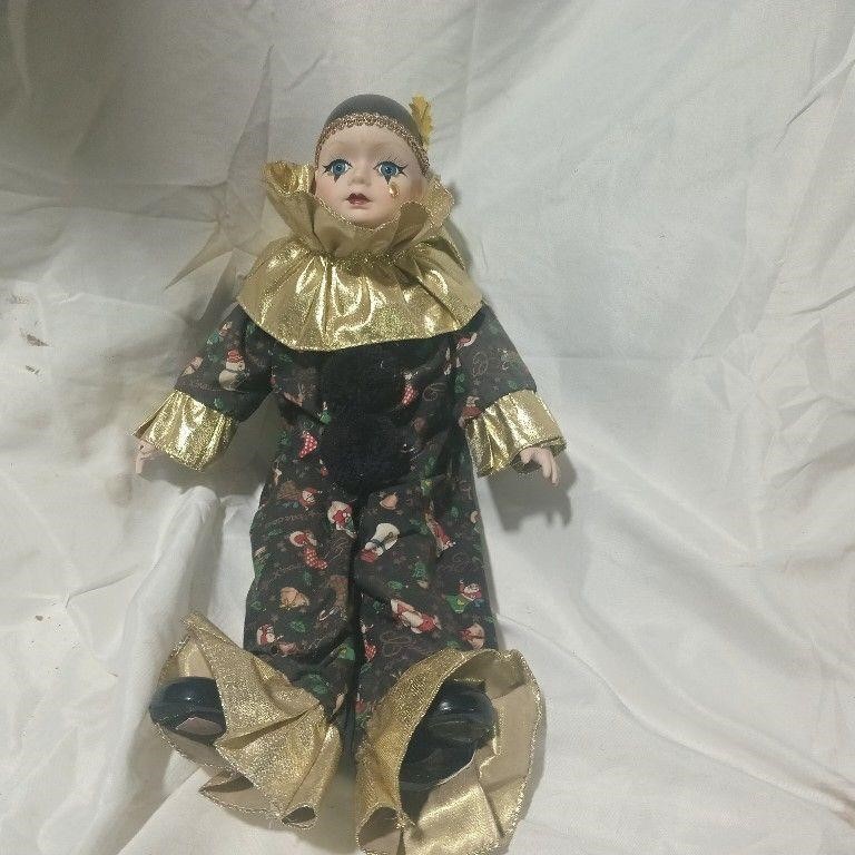 Gold and black vintage jester doll