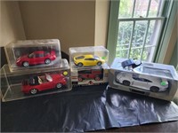 5 Die Cast cars.  Porsche models and Cal Ripken