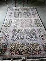 Wool rug.  9'5" x 6'2" center medallion with