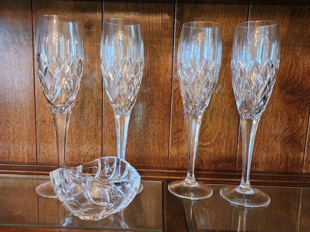 4 Waterford champagne flutes and small bowl.